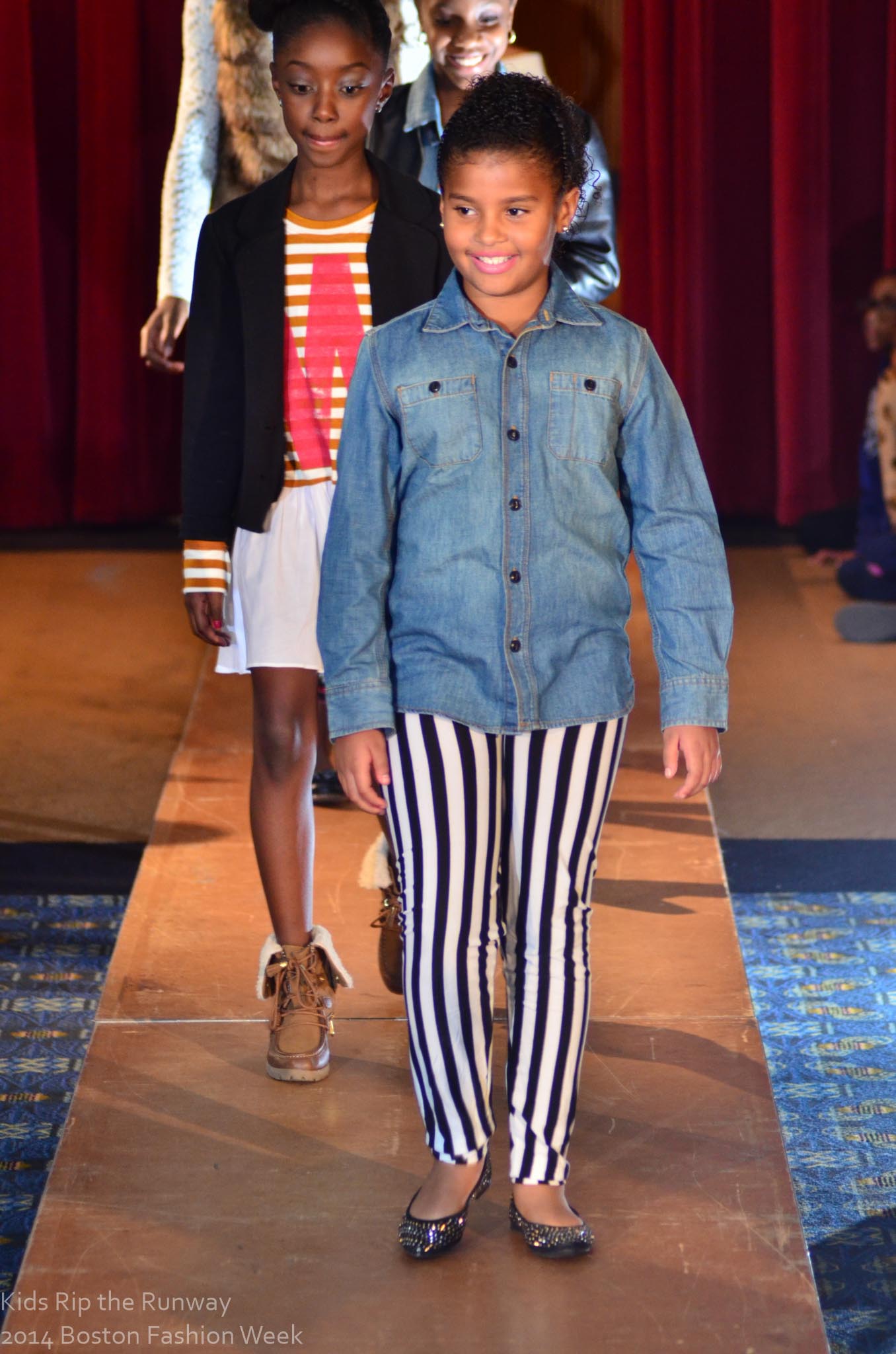 Young models taking their final walk together at an original Kids Rip the Runway show.